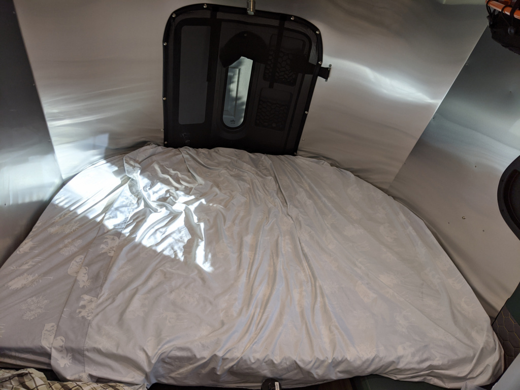 Mattress topper with sheets installed in the Basecamp